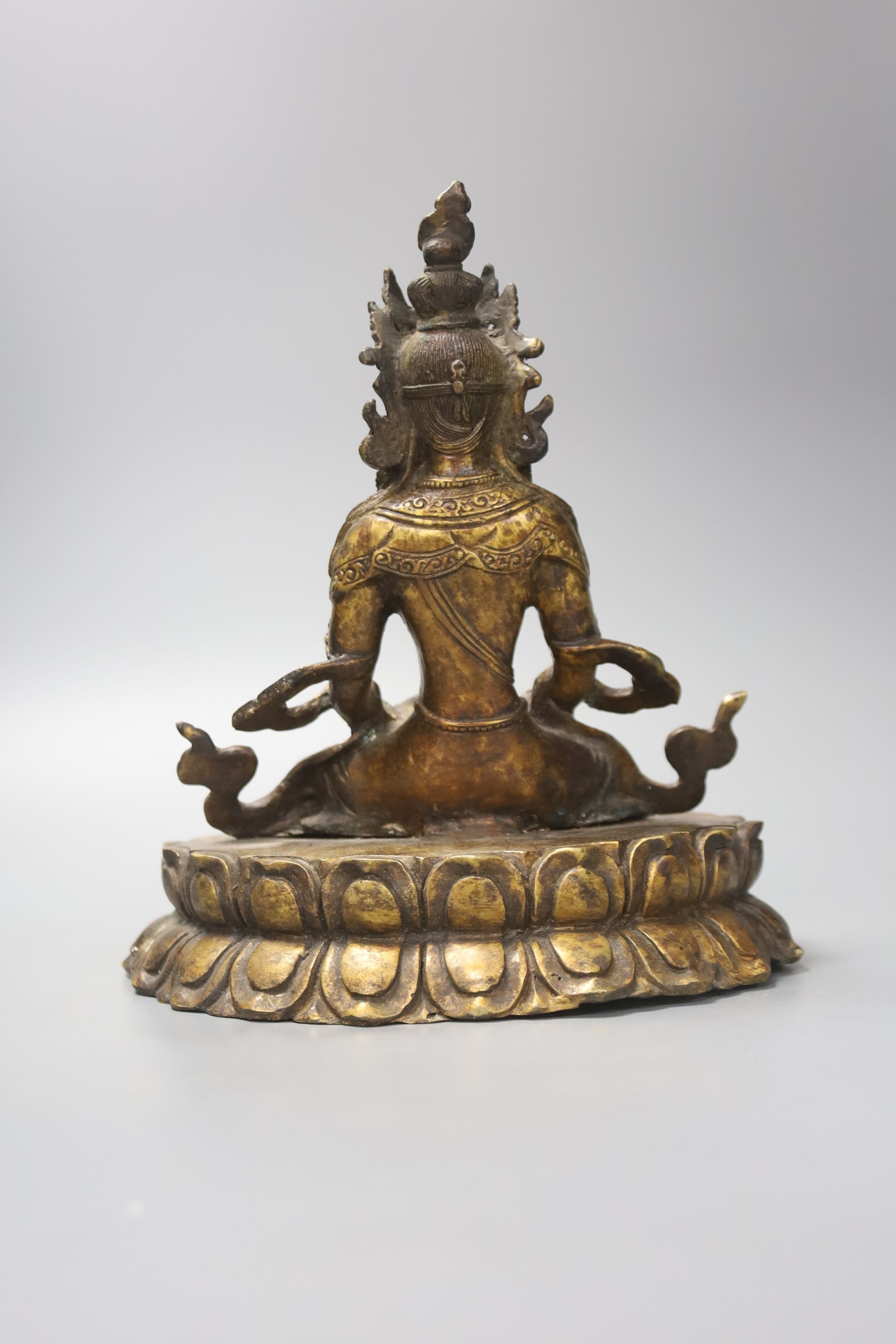 A seated bronze figure of a Bodhisattva, 20cm